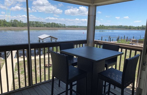 Carrabelle House | Fisherman's access and relaxation in a 2BR 2BA on River with Dock, Pet friendly!
