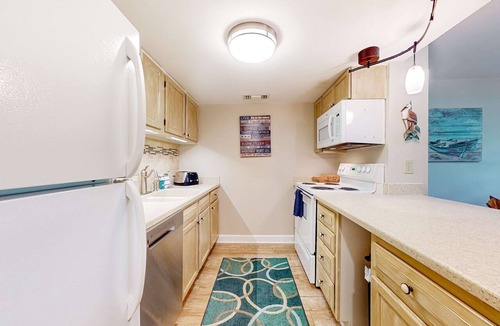 West Beach Village Condo | Five minute walk to beautiful beaches, golf course views, pet friendly