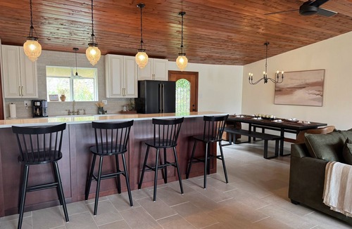 Hudson Bend House | Gated Lakefront villa with pickleball court, fire-pit, stunning views, and more!