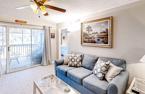 Colonial Charters Condo | Golf course community condo with fairway views, on-site pool, & balcony