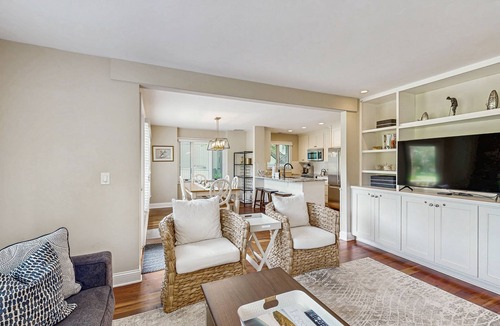 West Beach Village House | Golf-view villa with private deck, AC, & W/D - walk to beach - dog-friendly