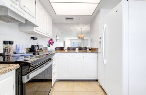 Port Canaveral Condo | Gorgeous Cocoa Beach Getaway w/Pool, Tennis & Steps from the Pier!