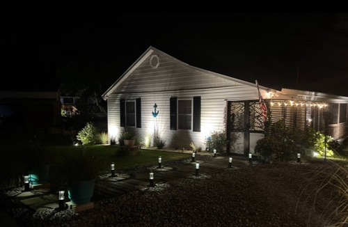 Shallotte House | Gorgeous creekside cottage with firepit, board games, dock, deck, & washer/dryer