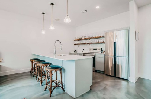 South Congress Apartment | Gorgeous Designed Three Bedroom Two Bath Sleeps 8 + Pool, Gym, Lovely Coffee Bar