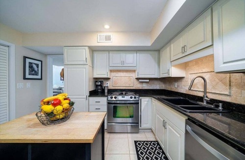 Spinnaker Beachhouses Villa | Great 2 Bedroom Spinnaker w/Golf/Lagoon Views! Amenity access included! Screened Porch!