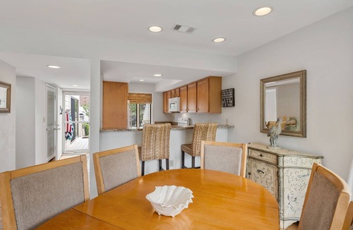 Spinnaker Beachhouses Villa | Great Location! Walk to Beach, Club, Golf, Pools! Distant Ocean Views! Amenity access included!