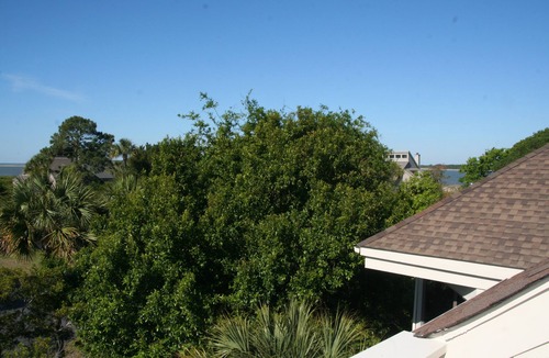 Spinnaker Beachhouses Villa | Great Location! Walk to Beach, Club, Golf, Pools! Distant Ocean Views! Amenity access included!