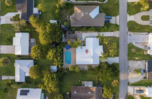 Butler Beach House | High Style Privacy Near the Beach, Heated Pool & Hot Tub