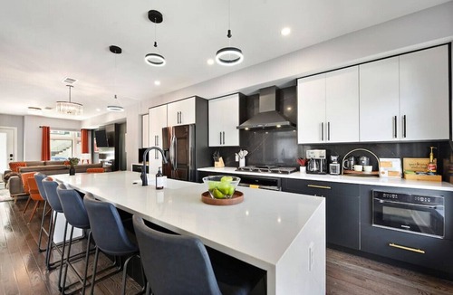 Lawrenceville House | ★ HostWise Stays ★ Rooftop Deck & Fire Pit Haven | Theater & Balcony