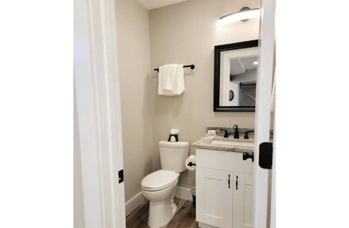 Conyers House | Hot tub & game room! 2 bed, 1.5 bath bsmt space