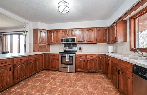 Barium Springs House | Hot Tub, Lakefront, EV Charger, Screened Porch, Private Dock, Pet Friendly