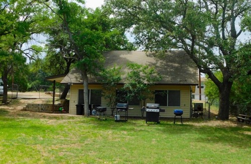 Kingsland Cottage | house and lighted deck fenced yardn