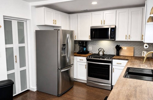 Sylvania House | In-Town Sylvania Cottage with Fireplace, Deck & Renovated Interior