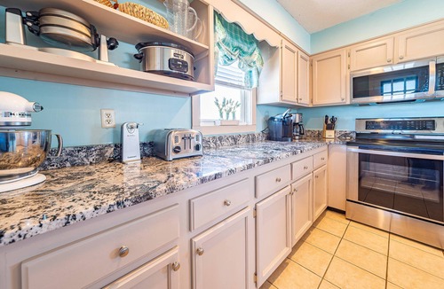 South Nags Head House | K1117 - Sunrise Views & Coastal Luxury – Community Pool, Hot Tub, PETS OK! Steps to the Sand!
