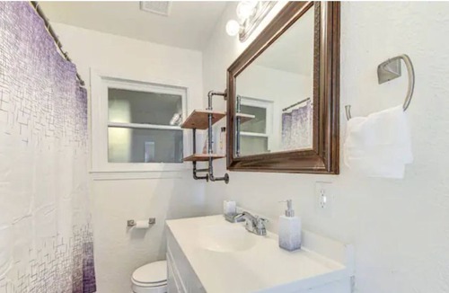 Beaumont House | king bed with Pool table, decked patio and gym
