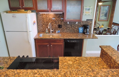 Poipu Condo | Kuhio Shores 119 - Two Bedroom Condo with White Water Ocean Views with A/C