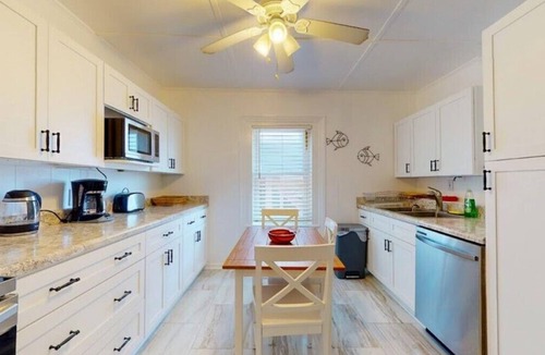 Kure Beach Cottage | Kure Cottage-Feel the uniqueness of this classic oceanfront Beach Cottage Vacation Rental in Kure Beach.