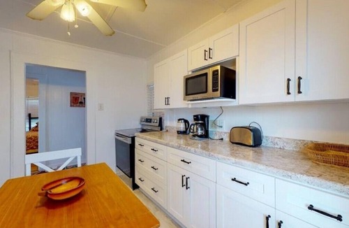 Kure Beach Cottage | Kure Cottage-Feel the uniqueness of this classic oceanfront Beach Cottage Vacation Rental in Kure Beach.