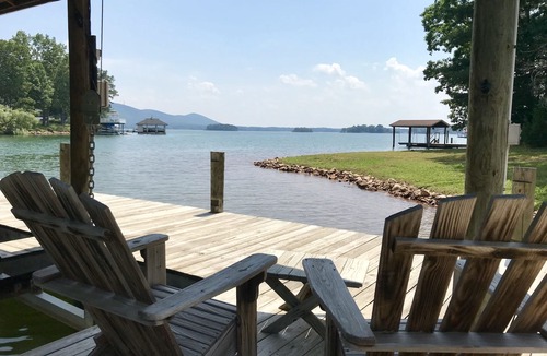 Huddleston Cottage | LAKE LIVING AT ITS FINEST. Cozy cottage with wide water and mountain views.