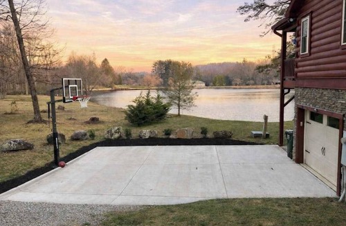 Mills River House | Lakefront Blue Ridge Cabin: balcony, firepit, wet bar, washer/dryer, dock, & AC