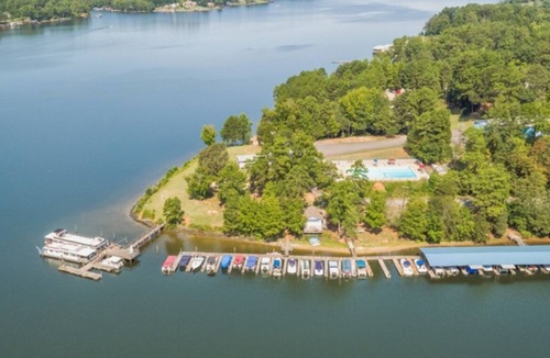 Steele Creek Cabin | Lakefront Property Two Bedroom Cabin #32 at Long Cove Resort by RedAwning