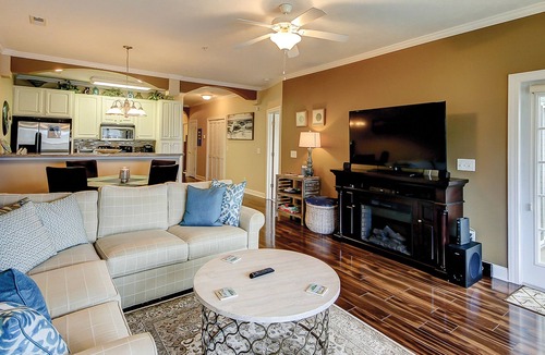Carolina Yacht Landing Condo | Lakefront, second-floor condo in gated community with balcony, pool & hot tub