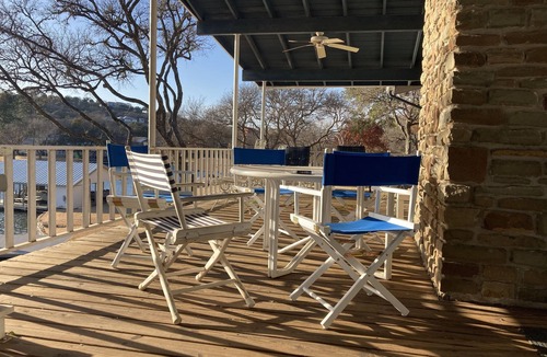 Sunrise Beach Village House | Lakefront retreat on quiet cove with large deck and sweeping views.