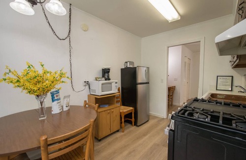 Flat Rock Apartment | Lakeview 1BR Condo w Deck Walk to Village