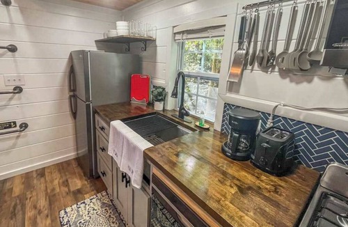 Mills River House | Lakeview tiny home with a loft, full kitchen, furnished deck, & firepit