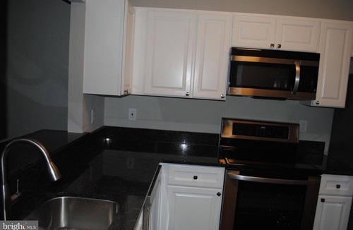 Odenton Condo | Lovely 2 bed/1bath corner unit with a private balcony.