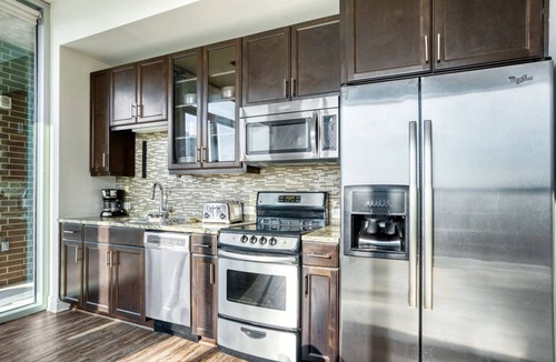 Waller Creek District Apartment | Luxe Downtown 1BR w/Gym, Deck & W/D, walk to 6th St bars, by Blueground