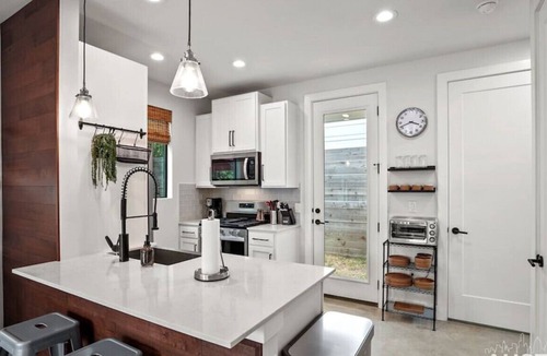Rosewood House | Luxe King Primary + Comfort and Cool Shaded Patio