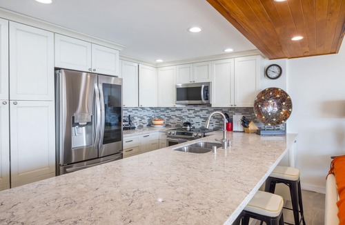 Makaha Condo | Luxurious corner condo, totally updated Stunning views on wrap around lanai !