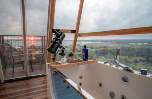 Cottonwood Shores Cabin | Luxury Glass A-Frame Escape with Cliffside Balcony & Spa Features in Cottonwood Shores, Texas