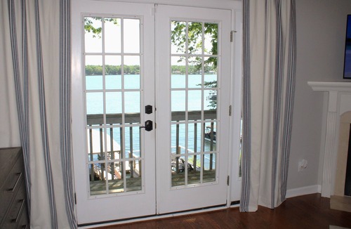 Terrell House | Luxury lakefront home with a covered private dock & large game room