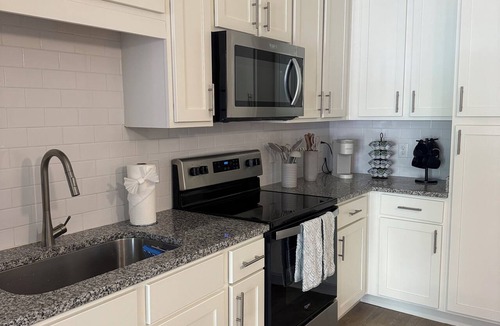 Golden Glades - The Woods Apartment | Luxury Modern Stay Near Mayo Clinic and Beaches!