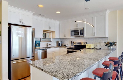 Carolina Beach Condo | Luxury Oceanfront Top Floor Condo w/Rooftop Deck, Stunning Views, Pool & Elevator in Downtown CB