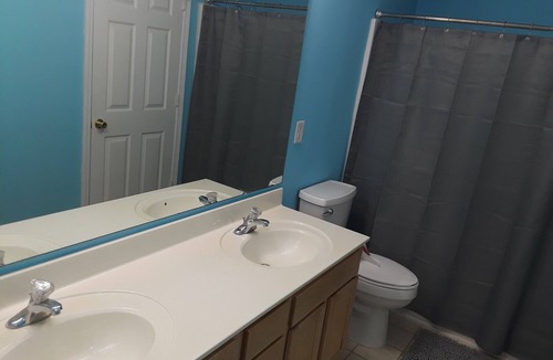 Fort Mill House | Master bedroom w/private bathroom.