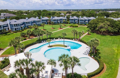 Debordieu Colony Condo | Memories Await, A Beautiful, Ocean View Villa featuring a wet bar, flat screens and wifi.