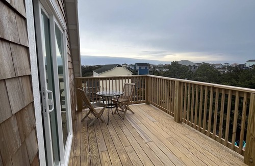 Salvo Apartment | Modern apartment above surf shop with ocean and sound view from private deck