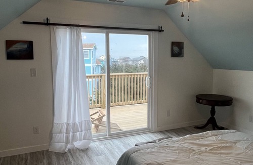 Salvo Apartment | Modern apartment above surf shop with ocean and sound view from private deck