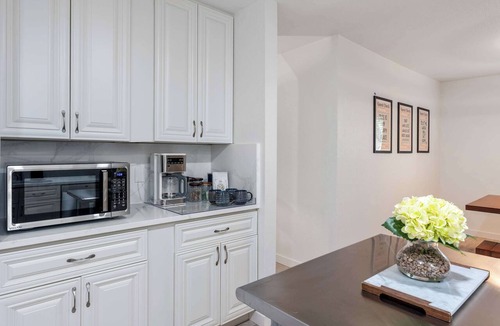 Milwood House | Modern Living | Vaulted Ceilings | Curated Library