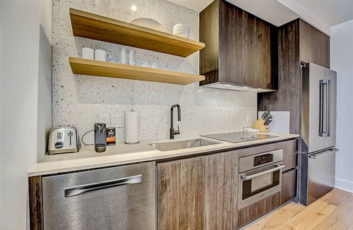 Rainey Street Historic District Apartment | Natiivo Austin studio - lake & skyline-view balcony, pool & gym - dogs OK
