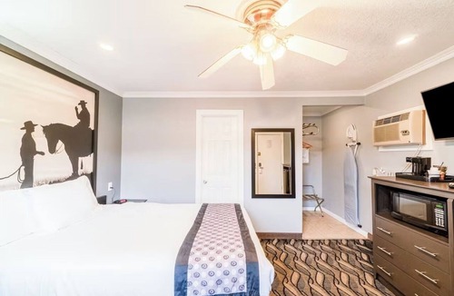 Ira Hotel | Near Sammy Baugh Golf Course & Local Dining Spots | Queen Bed Non‑Smoking