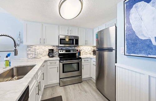 Crescent Beach Condo | NEW Baywatch Renovated with Direct Oceanfront Views