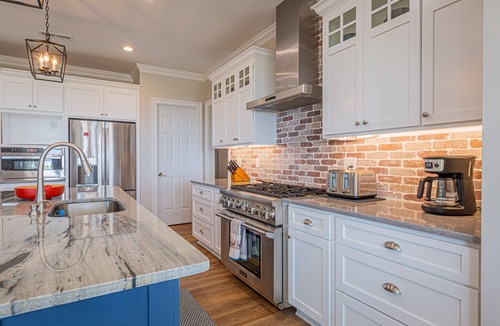 Kilmarnock House | Newly Built Waterfront Home on Galway Bay with Sandy Beach, Dock and Hot Tub.