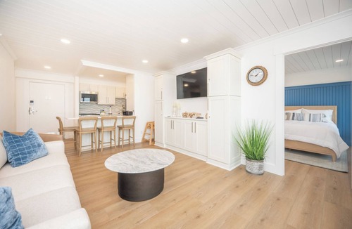 Northeast Virginia Beach Condo | Oceanfront 2 BR VA Beach Condo, Balcony Over Boardwalk, Sleeps 8, Pool & Sauna