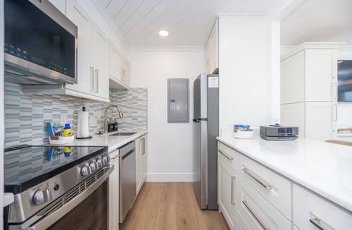 Northeast Virginia Beach Condo | Oceanfront 2 BR VA Beach Condo, Balcony Over Boardwalk, Sleeps 8, Pool & Sauna
