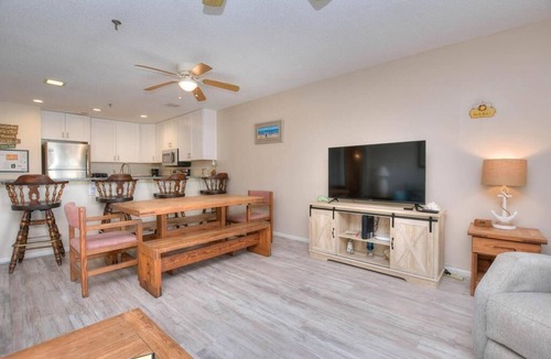 Long Beach Condo | Oceanfront comfort at SSV 108-Finz Up in Oak Island, perfect for family getaways!