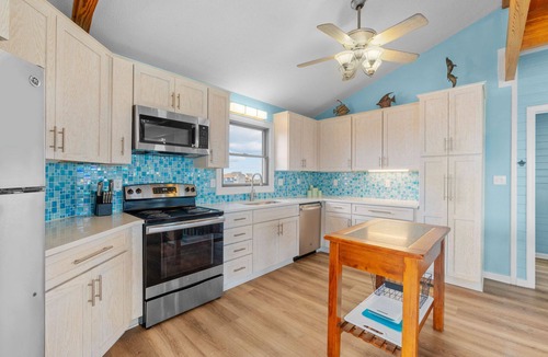 Salvo House | Oceanfront Dog Friendly Home w/Shuffleboard, Smart TV, and Direct Beach Access